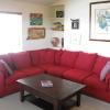 The living room accommodates a large group of friends both new and old.