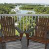 Relax from the balcony of Above the Rest. Expansive view of the mangrove estuarary.